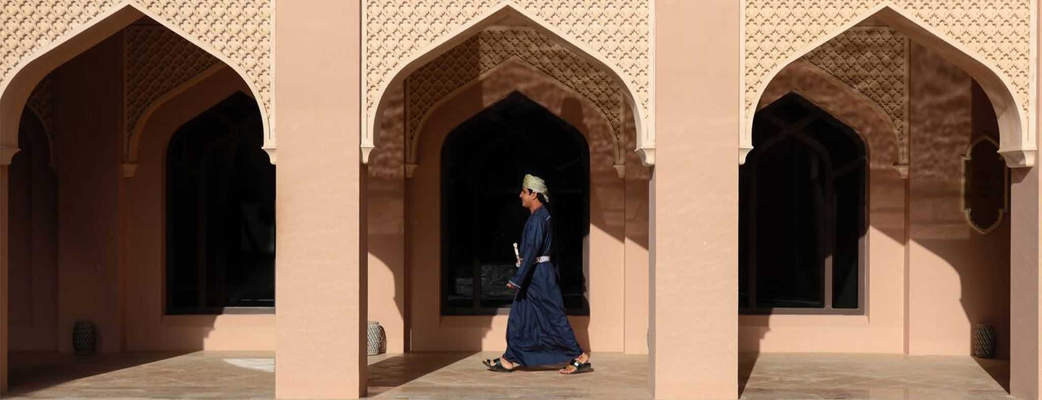 Traditional Omani walking in National Dress